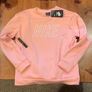 Nike Brand. Light Pink Crew Neck. Size: XS. NWT.